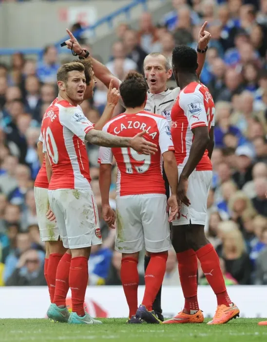 Framed Print : Arsenal's Dispute with Referee: Wilshere, Cazorla, and Welbeck at Chelsea's Stamford Bridge (2014-15) Framed Print : Arsenal's Dispute with Referee: Wilshere, Cazorla, and Welbeck at Chelsea's Stamford Bridge (2014-15)