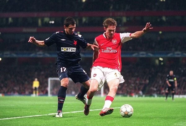 Arsenal's Dominance: Alex Hleb Shines in 7-0 Victory over Slavia Prague in Champions League Group H