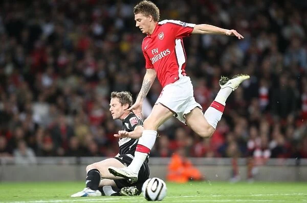 Arsenal's Dominance: Bendtner Scores Twice in 6-0 Carling Cup Win Over Sheffield United