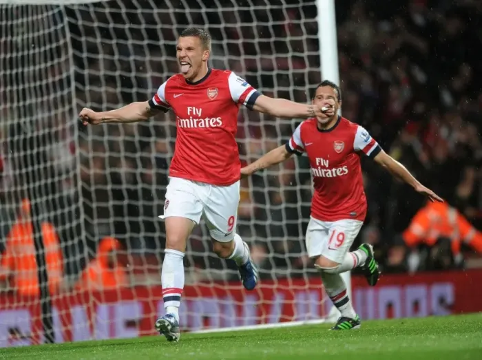 Framed Print : Arsenal's Dominance: Podolski's Brace - Arsenal Crushes Wigan Athletic 4-1 in Premier League (2012-13) Framed Print : Arsenal's Dominance: Podolski's Brace - Arsenal Crushes Wigan Athletic 4-1 in Premier League (2012-13)