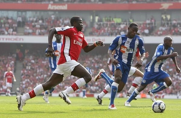 Arsenal's Dominant Display: 4-0 Victory over Wigan with Eboue and Figueroa