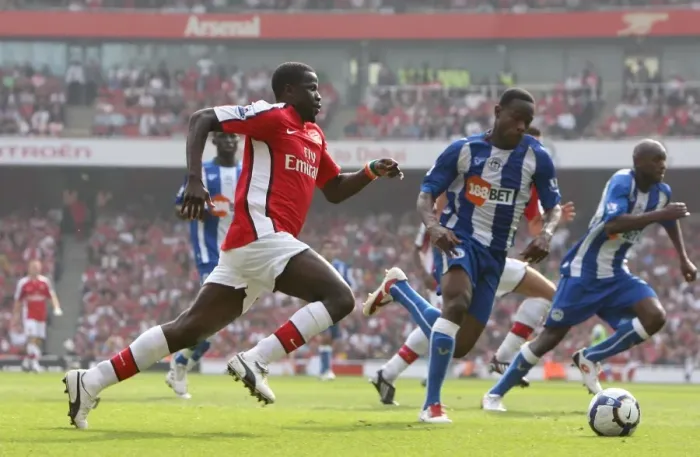 Framed Print : Arsenal's Dominant Display: 4-0 Victory over Wigan with Eboue and Figueroa Framed Print : Arsenal's Dominant Display: 4-0 Victory over Wigan with Eboue and Figueroa