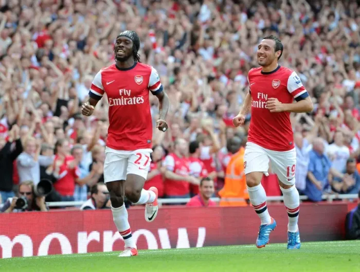 Framed Print : Arsenal's Dominant Display: Gervinho and Cazorla's Jubilant Celebration - Arsenal 6:1 Southampton (Premier League, Emirates Stadium, September 15, 2012)