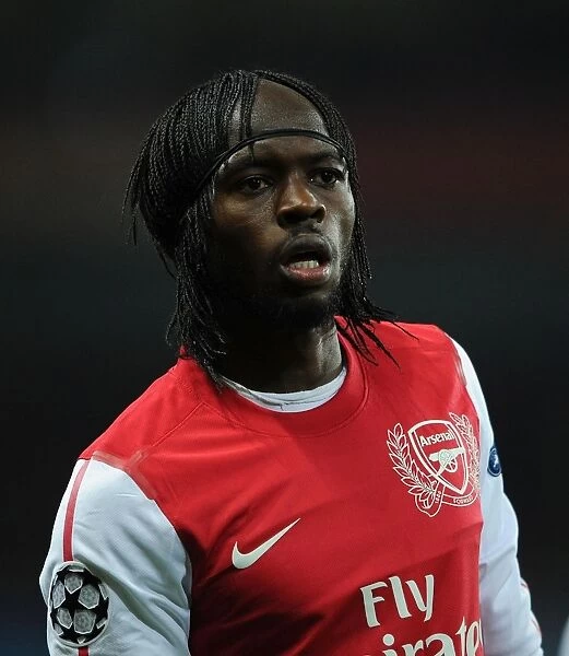 Arsenal's Dominant Display: Gervinho Scores in 3-0 UEFA Champions League Victory over AC Milan