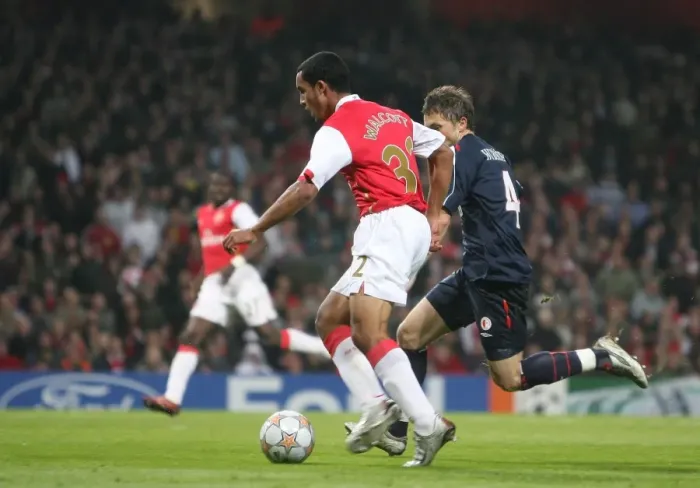 Framed Print : Arsenal's Dominant Display: Theo Walcott Scores Brace in 7-0 Champions League Thrashing of Slavia Prague