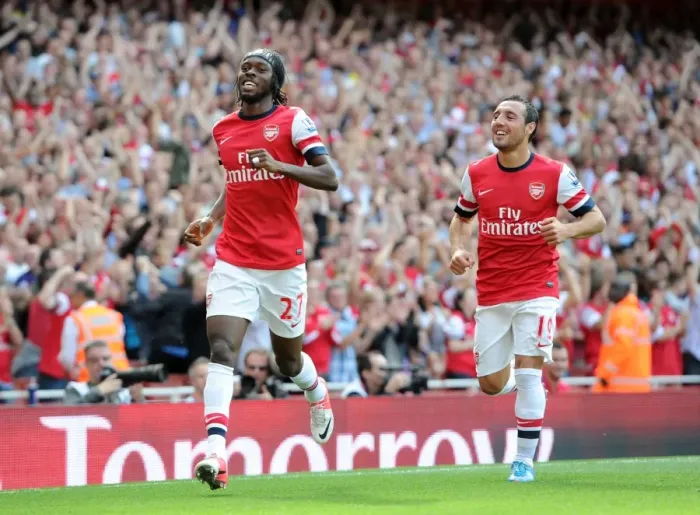 Framed Print : Arsenal's Dominant Performance: Gervinho and Cazorla's Unforgettable 6-1 Goal Celebration vs. Southampton