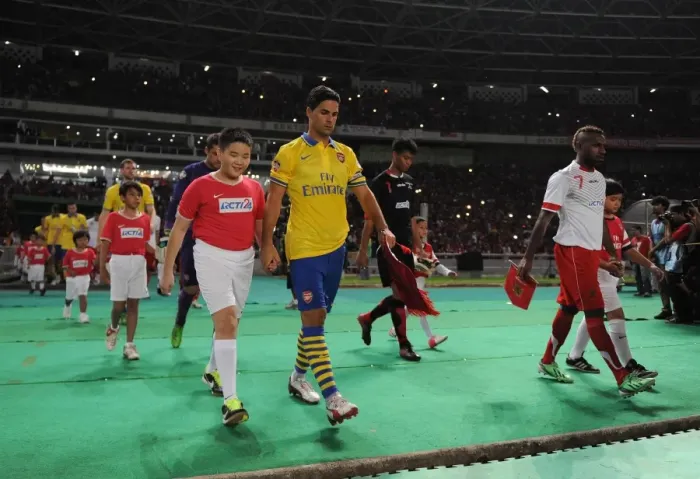 Framed Print : Arsenal's Dominant Pre-Season Victory: Mikel Arteta Leads the Gunners to a 7-0 Win Over Indonesia Dream Team (2013) Framed Print : Arsenal's Dominant Pre-Season Victory: Mikel Arteta Leads the Gunners to a 7-0 Win Over Indonesia Dream Team (2013)