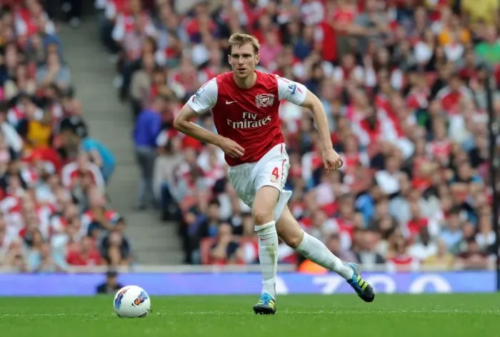 Framed Print : Arsenal's Dominant Victory: Per Mertesacker Scores in 3-0 Win over Bolton Wanderers (Premier League, 2011) Framed Print : Arsenal's Dominant Victory: Per Mertesacker Scores in 3-0 Win over Bolton Wanderers (Premier League, 2011)