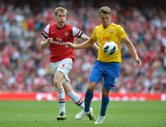 Framed Print : Arsenal's Dominant Victory: Per Mertesacker Scores in Arsenal's 6-1 Thrashing of Southampton (Premier League, 2012-13) Framed Print : Arsenal's Dominant Victory: Per Mertesacker Scores in Arsenal's 6-1 Thrashing of Southampton (Premier League, 2012-13)