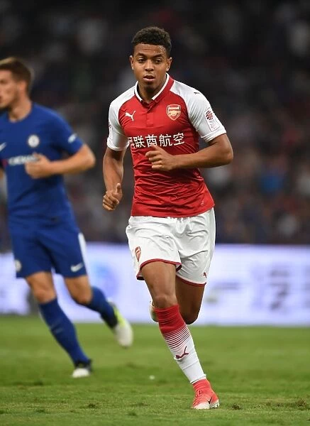 Arsenal's Donyell Malen Goes Head-to-Head Against Chelsea in Beijing Friendly
