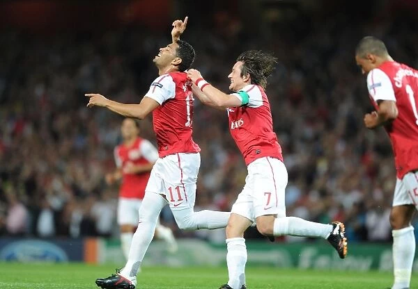 Arsenal's Double Act: Rosicky and Santos Score in Champions League Victory over Olympiacos (2011-12)