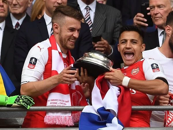 Arsenal's Double Celebration: Ramsey and Sanchez Rejoice in FA Cup Victory