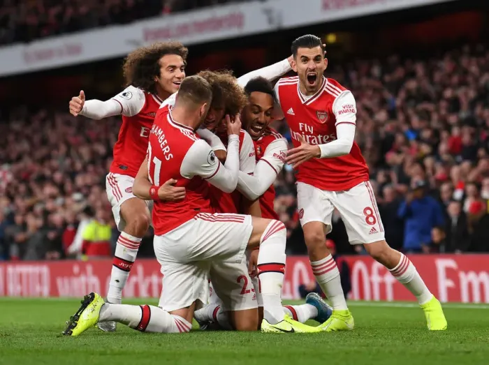 Framed Print : Arsenal's Double Delight: Luiz, Aubameyang, Ceballos, and Guendouzi Celebrate Goal Scoring Moment (2019-20)