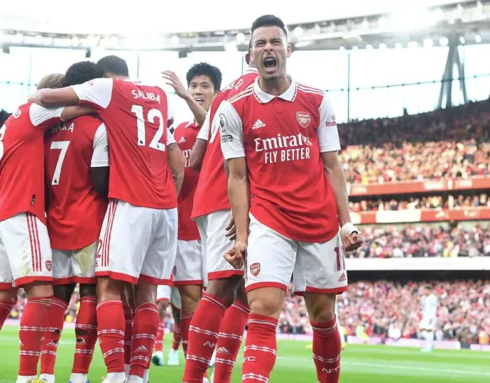 Framed Print : Arsenal's Double Strike: Martinelli & Saka Celebrate against Liverpool in the Premier League (2022-23)
