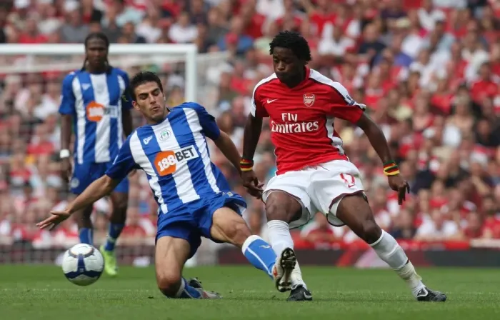 Framed Print : Arsenal's Double Victory: 4-0 Over Wigan Athletic Featuring Alex Song vs. Jordi Gamez, Emirates Stadium, September 19, 2009 Framed Print : Arsenal's Double Victory: 4-0 Over Wigan Athletic Featuring Alex Song vs. Jordi Gamez, Emirates Stadium, September 19, 2009