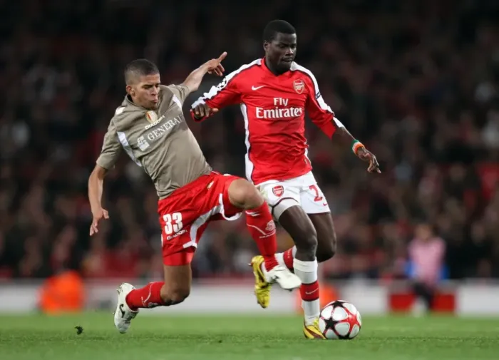 Framed Print : Arsenal's Eboue and Carcela-Gonzalez Shine in 2:0 UEFA Champions League Victory over Standard Liege Framed Print : Arsenal's Eboue and Carcela-Gonzalez Shine in 2:0 UEFA Champions League Victory over Standard Liege