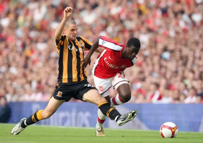 Framed Print : Arsenal's Eboue Clashes with Hull's Marney: 1-2 Loss in Premier League Framed Print : Arsenal's Eboue Clashes with Hull's Marney: 1-2 Loss in Premier League