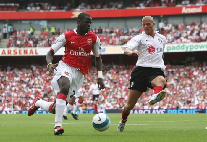Framed Print : Arsenal's Eboue vs. Konchesky: A Battle at Emirates Stadium - Arsenal's 2:1 Victory in the Premier League (December 8, 2007) Framed Print : Arsenal's Eboue vs. Konchesky: A Battle at Emirates Stadium - Arsenal's 2:1 Victory in the Premier League (December 8, 2007)