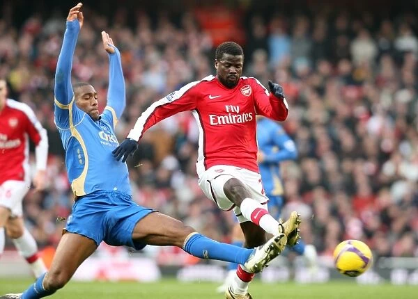 Arsenal's Eboue vs. Distin: Clash of Titans in Arsenal's 1:0 Victory over Portsmouth, Barclays Premier League, Emirates Stadium, 12 / 28 / 08