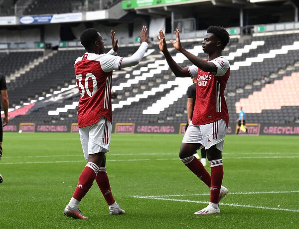 Arsenal's Eddie Nketiah and Bukayo Saka Celebrate Goals in MK Dons Friendly, 2020