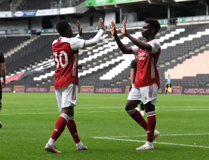 Framed Print : Arsenal's Eddie Nketiah and Bukayo Saka Celebrate Goals in MK Dons Friendly, 2020 Framed Print : Arsenal's Eddie Nketiah and Bukayo Saka Celebrate Goals in MK Dons Friendly, 2020