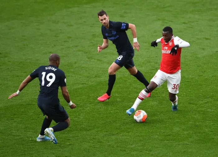 Framed Print : Arsenal's Eddie Nketiah Clashes with Everton's Schneiderlin and Sidibe in Premier League Showdown Framed Print : Arsenal's Eddie Nketiah Clashes with Everton's Schneiderlin and Sidibe in Premier League Showdown