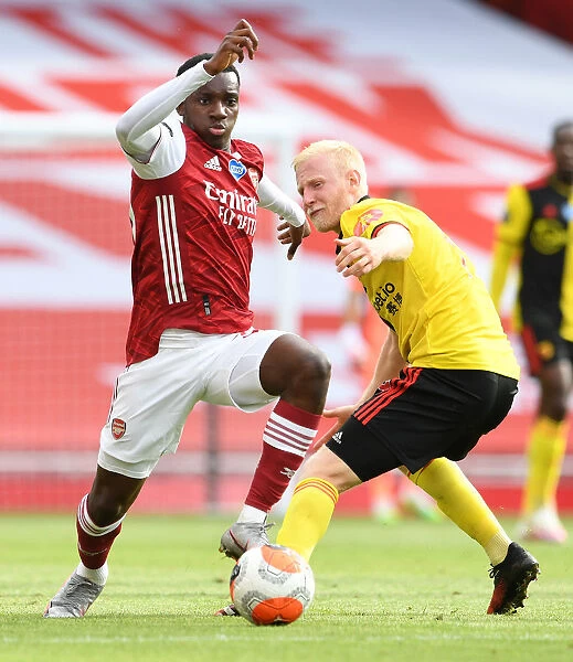 Arsenal's Eddie Nketiah Clashes with Watford's Will Hughes in Premier League Showdown