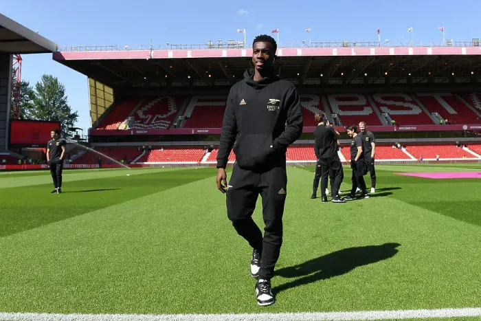 Framed Print : Arsenal's Eddie Nketiah Examines Nottingham Forest's Premier League Pitch Before Showdown (2022-23)