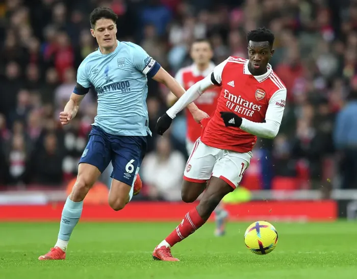 Framed Print : Arsenal's Eddie Nketiah Faces Off Against Brentford's Christian Norgaard in Premier League Clash at Emirates Stadium