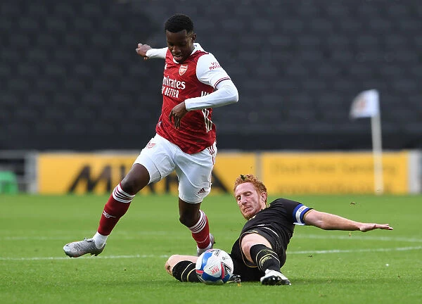 Arsenal's Eddie Nketiah Faces Off Against Dean Lewington in Intense Pre-Season Clash