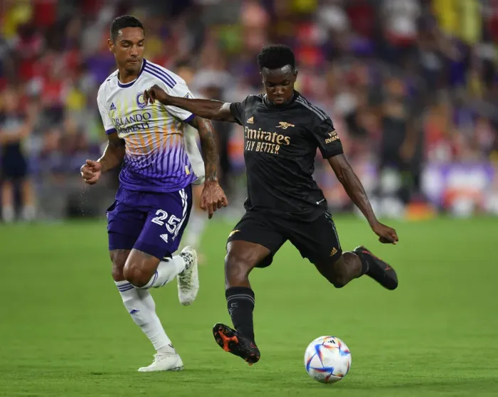 Framed Print : Arsenal's Eddie Nketiah Faces Off Against Orlando City's Antonio Carlos in Pre-Season Showdown Framed Print : Arsenal's Eddie Nketiah Faces Off Against Orlando City's Antonio Carlos in Pre-Season Showdown