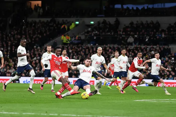 Framed Print : Arsenal's Eddie Nketiah Faces Off Against Tottenham's Clement Lenglet in Intense Premier League Showdown