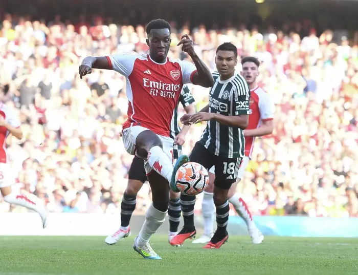 Framed Print : Arsenal's Eddie Nketiah Goes Head-to-Head with Manchester United in the 2023-24 Premier League Showdown Framed Print : Arsenal's Eddie Nketiah Goes Head-to-Head with Manchester United in the 2023-24 Premier League Showdown