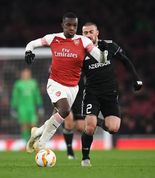Framed Print : Arsenal's Eddie Nketiah Goes Head-to-Head with Qarabag's Gara Gareyev in Europa League Showdown Framed Print : Arsenal's Eddie Nketiah Goes Head-to-Head with Qarabag's Gara Gareyev in Europa League Showdown