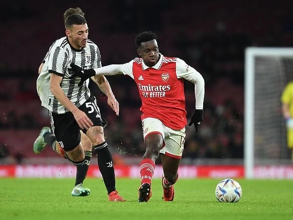 Arsenal's Eddie Nketiah Outmaneuvers Juventus Alessandro Ricco in 2022-23 Friendly Clash