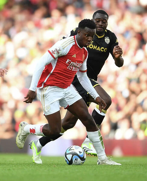 Arsenal's Eddie Nketiah Outmaneuvers AS Monaco's Youssouf Fofana in 2023-24 Emirates Cup Clash