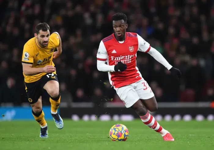 Framed Print : Arsenal's Eddie Nketiah Outmaneuvers Wolverhampton's Jonny in Premier League Clash