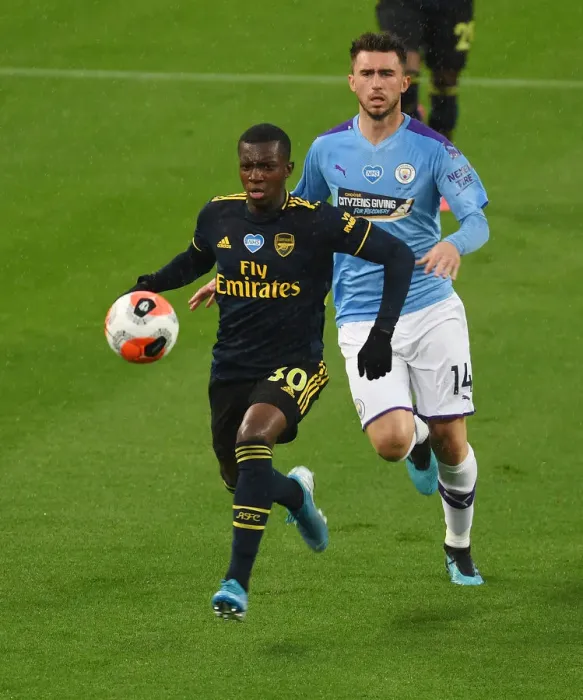 Framed Print : Arsenal's Eddie Nketiah Outwits Laporte: Premier League Upset as Arsenal Triumphs Over Manchester City (2019-20)