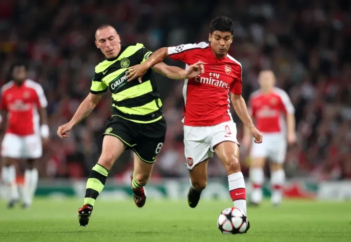 Framed Print : Arsenal's Eduardo and Scott Brown Clash in Intense UEFA Champions League Match: Arsenal 3:1 Celtic (2009) Framed Print : Arsenal's Eduardo and Scott Brown Clash in Intense UEFA Champions League Match: Arsenal 3:1 Celtic (2009)