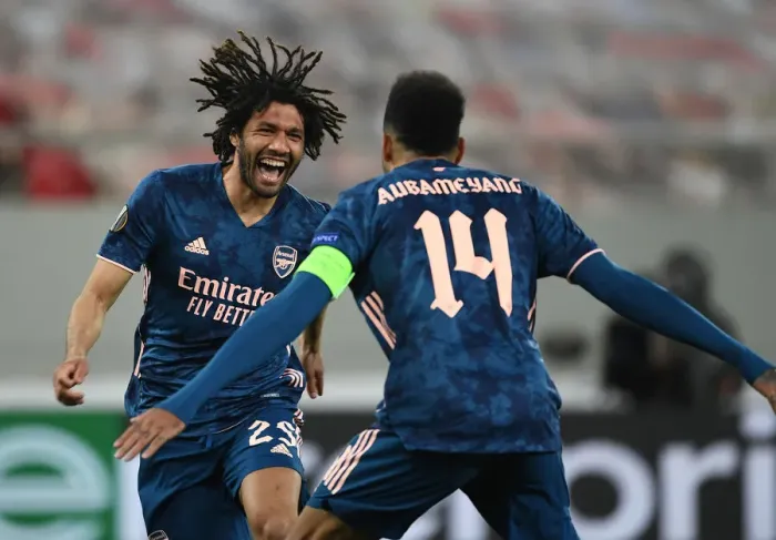 Framed Print : Arsenal's Elneny and Aubameyang Celebrate Goals in Empty Karaiskakis Stadium during Olympiacos Clash in Europa League Framed Print : Arsenal's Elneny and Aubameyang Celebrate Goals in Empty Karaiskakis Stadium during Olympiacos Clash in Europa League