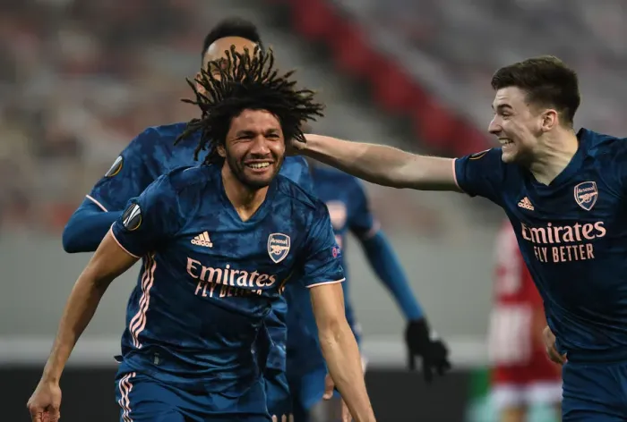 Framed Print : Arsenal's Elneny, Aubameyang, and Tierney Celebrate Goals in Empty Olympiacos Stadium during Europa League Match