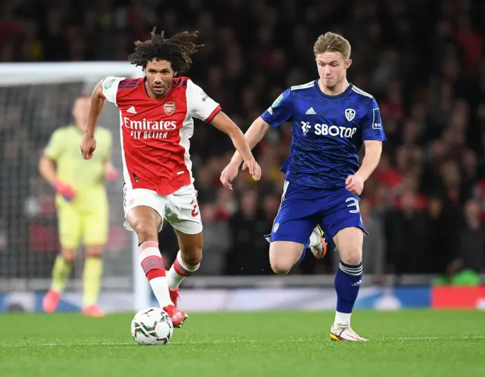 Framed Print : Arsenal's Elneny Outmaneuvers Leeds Gelhardt in Carabao Cup Clash