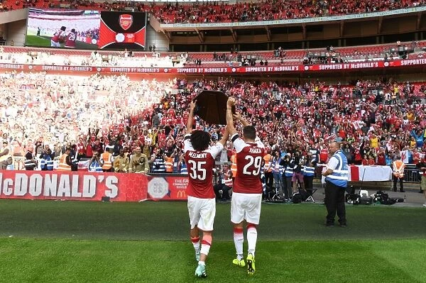 Arsenal's Elneny and Xhaka Celebrate FA Community Shield Victory with the Trophy