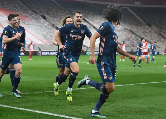 Framed Print : Arsenal's Elneny, Xhaka, and Tierney Celebrate Goals in Empty Karaiskakis Stadium during Olympiacos vs Arsenal, UEFA Europa League Round of 16 (March 11, 2021) Framed Print : Arsenal's Elneny, Xhaka, and Tierney Celebrate Goals in Empty Karaiskakis Stadium during Olympiacos vs Arsenal, UEFA Europa League Round of 16 (March 11, 2021)