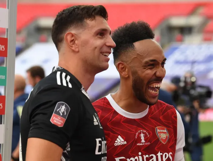 Framed Print : Arsenal's Emi Martinez and Pierre-Emerick Aubameyang Celebrate FA Cup Victory Amidst Empty Wembley Stadium