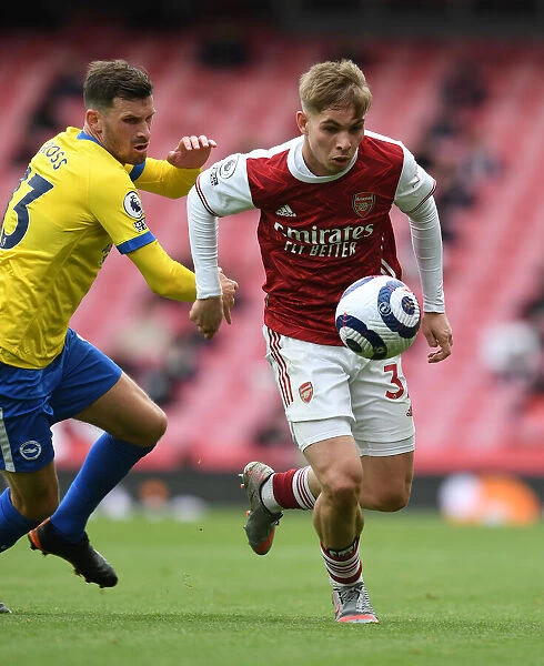 Arsenal's Emile Smith Rowe Breaks Past Brighton's Pascal Gross in 2020-21 Premier League Clash