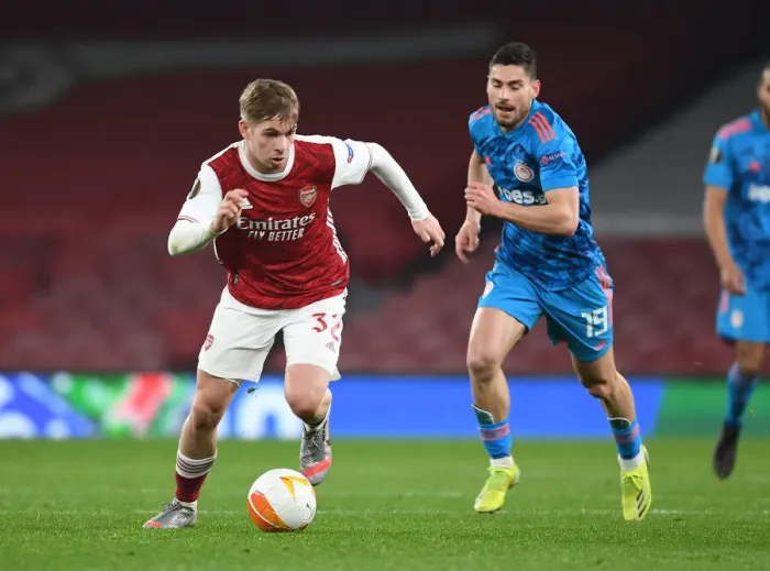 Framed Print : Arsenal's Emile Smith Rowe Breaks Past Olympiacos Giorgos Masouras in Empty Emirates Stadium - UEFA Europa League Round of 16