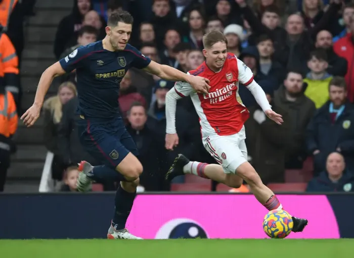 Framed Print : Arsenal's Emile Smith Rowe Clashes with Burnley's James Tarkowski in Premier League Showdown Framed Print : Arsenal's Emile Smith Rowe Clashes with Burnley's James Tarkowski in Premier League Showdown