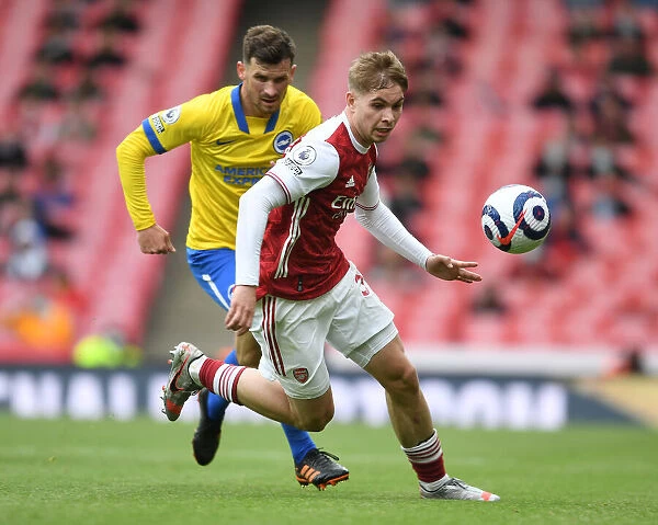 Arsenal's Emile Smith Rowe Outmaneuvers Brighton's Adam Webster in 2020-21 Premier League Clash