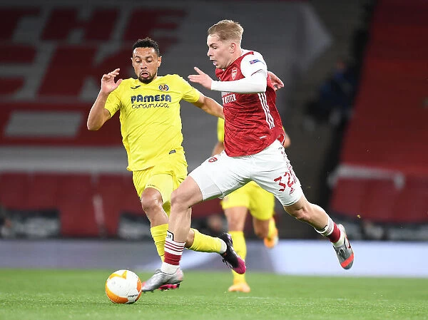 Arsenal's Emile Smith Rowe Overpowers Villarreal's Francis Coquelin in UEFA Europa League Semi-Final at Emirates Stadium